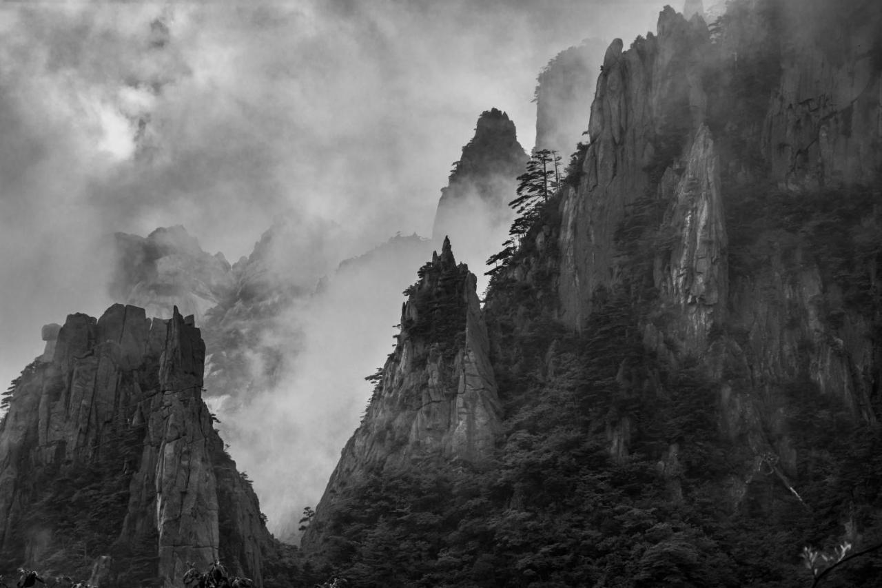 Kunlun International Youth Hostel Montes Huang Exterior foto